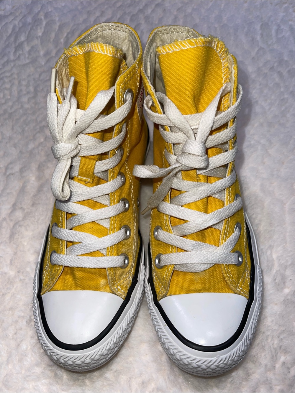 Yellow High-Top Converse Sneakers